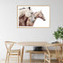 A brown and tan 3 Palomino Horses Artwork Wall Art Photo Print with a timber frame to hang next to your dining room table.