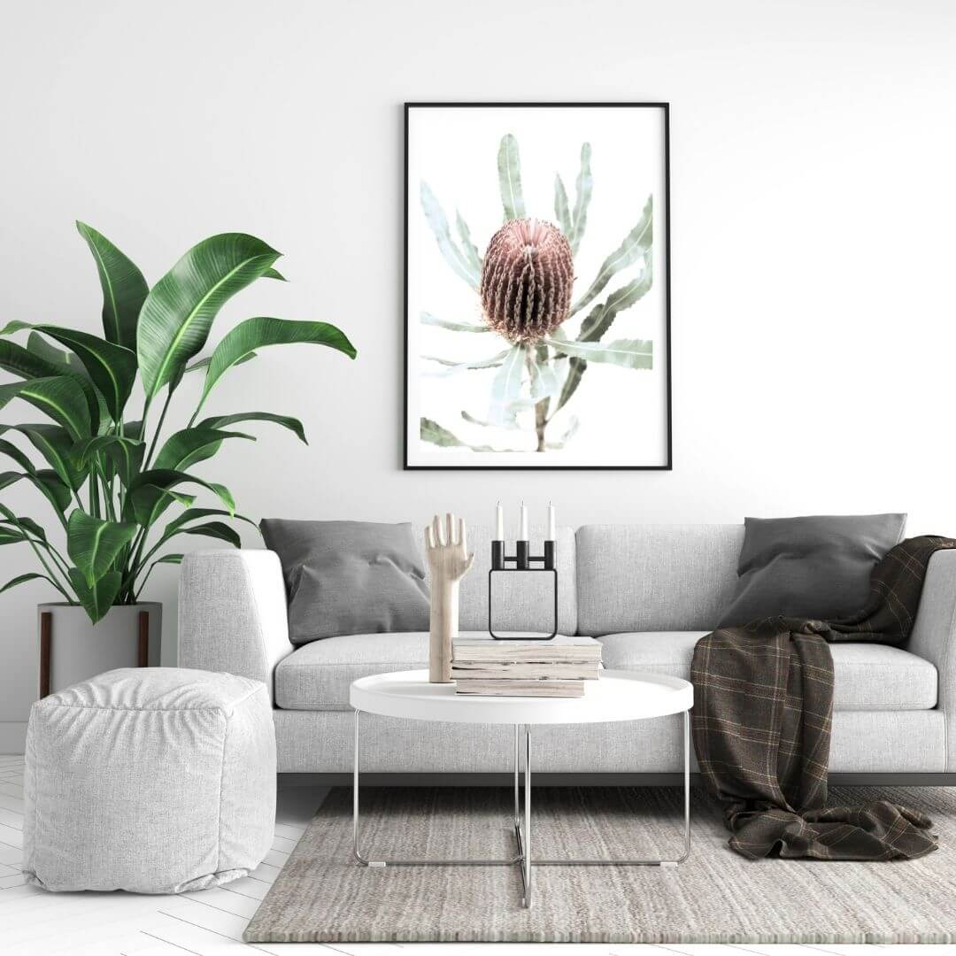 The wall art print of an Australian Native Banksia Floral B with a black frame or unframed on a living room wall
