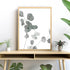 A wall art photo print of an Australian native eucalyptus leaves A with a timber frame to decorate your console table
