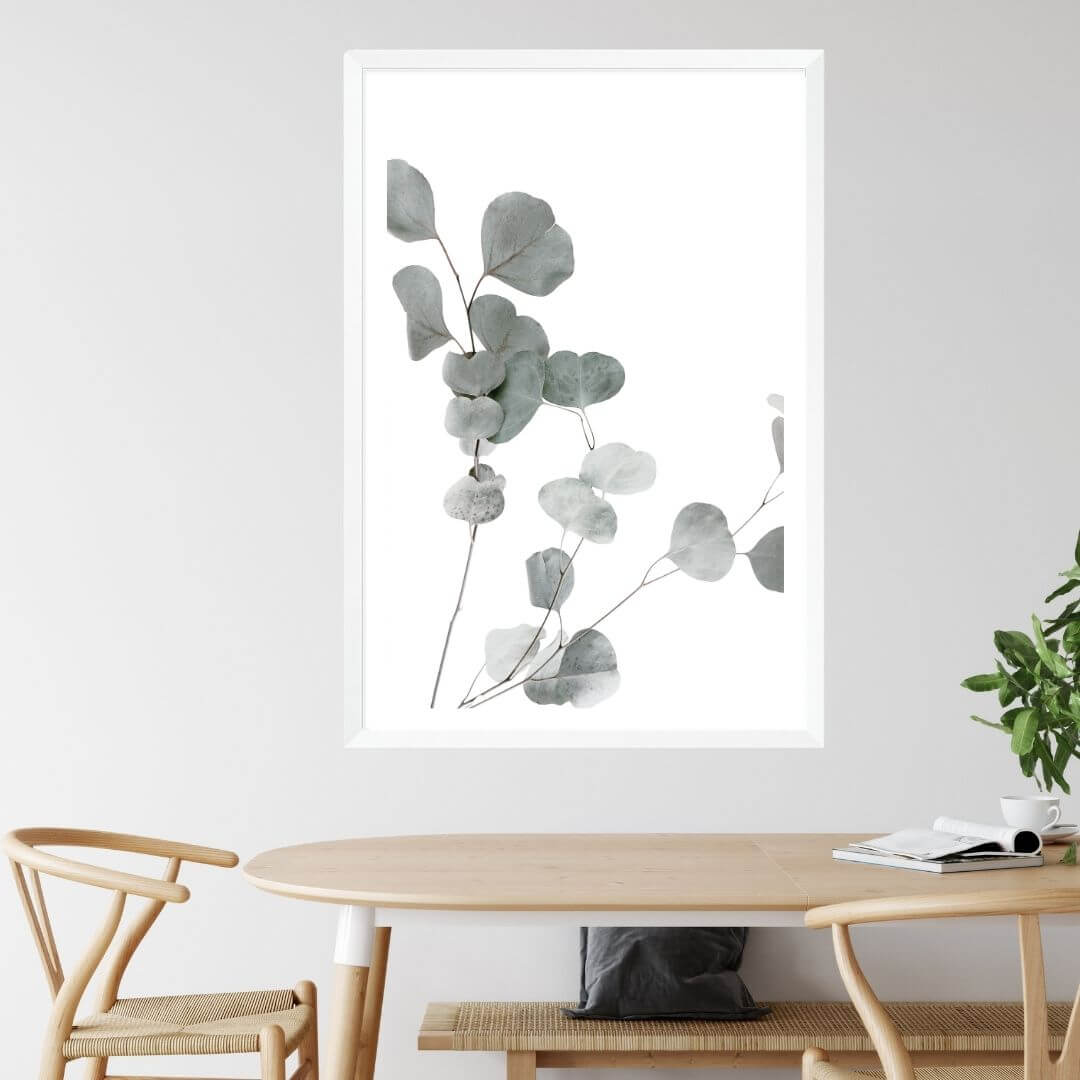 A wall art photo print of an Australian native eucalyptus leaves A with a white frame to style a coastal Australian dining room
