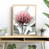 A wall art photo print of a red Australian native waratah flower A with a timber frame to decorate your console table