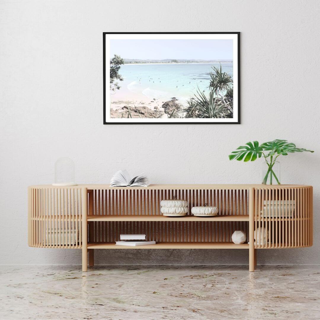 A wall art photo print of a Australian Watego Surf Beach B Byron Bay with a black frame to decorate your console table