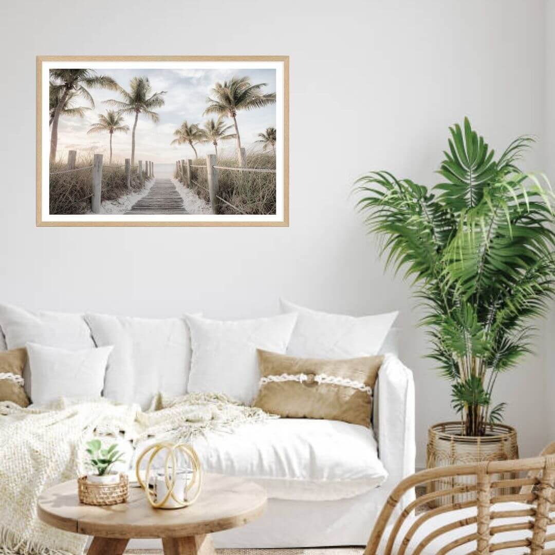A wall art photo print of a pathway to a beach on the keys florida with palm trees with a timber frame to style a coastal Australian dining room