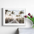 A wall art photo print of a pathway to a beach on the keys florida with palm trees with a white frame or unframed to style shelves and empty walls