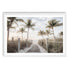 A wall art photo print of a pathway to a beach on the keys florida with palm trees with a white frame, white border by Beautiful Home Decor
