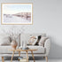 A wall art photo print of a beachside boardwalk with a timber frame or unframed for your coastal living room behind sofa
