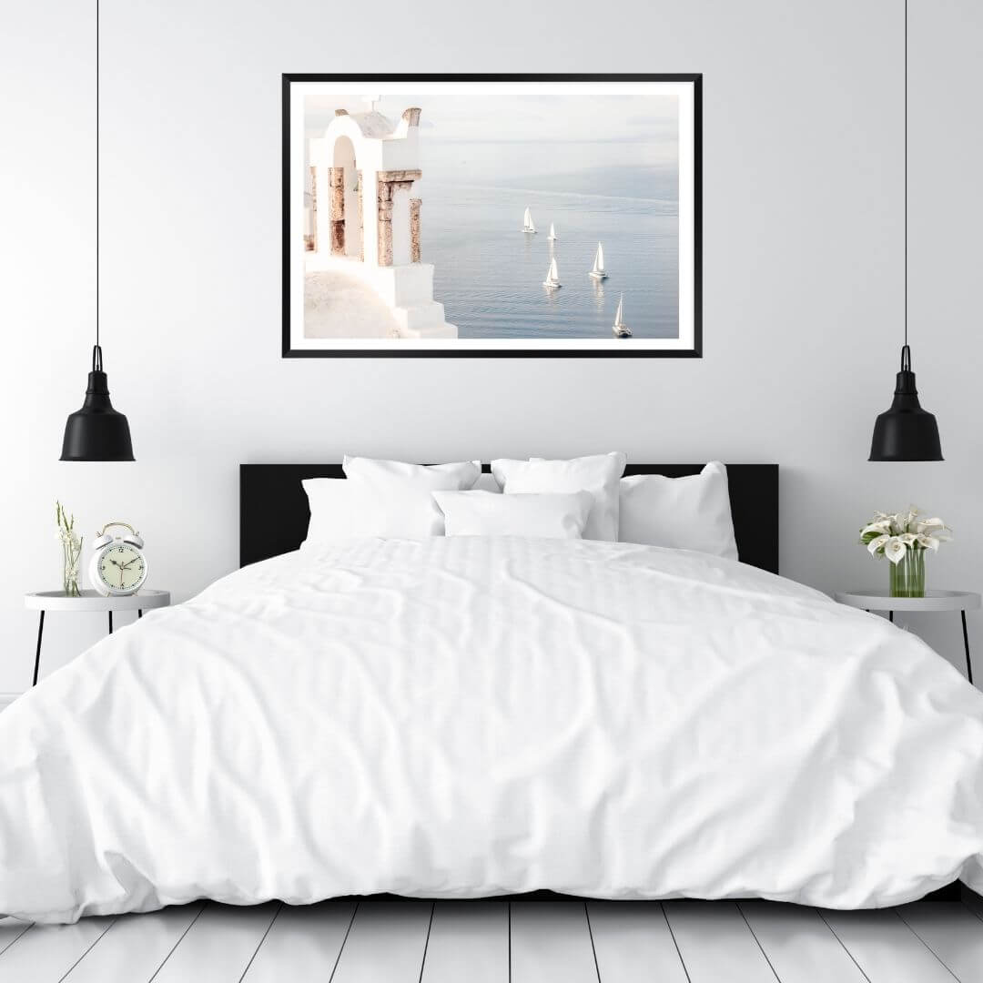 A wall art photo print of Boats sailing on the sea in Santorini Greece  with a black frame to decorate your bedroom by Beautiful HomeDecor