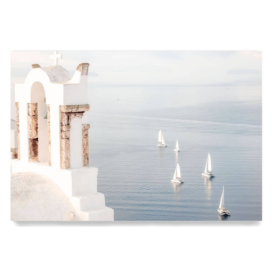 A coastal wall art photo print of Boats sailing on the sea in Santorini Greece  unframed, printed edge to edge without a white border