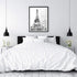 A black and white wall art photo print of the Eiffel Tower in Spring with a black frame or unframed to decorate a wall in your bedroom