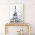 A black and white wall art photo print of the Eiffel Tower in Spring with a timber frame or unframed for your empty hallway walls