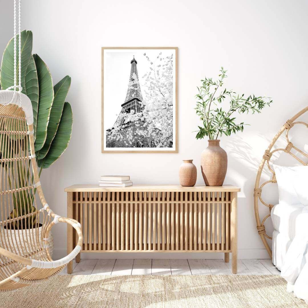 A black and white wall art photo print of the Eiffel Tower in Spring with a timber frame to style your bedroom walls