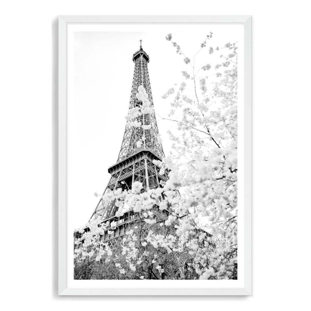 A black and white wall art photo print of the Eiffel Tower in Spring with a white frame, white border by Beautiful Home Decor