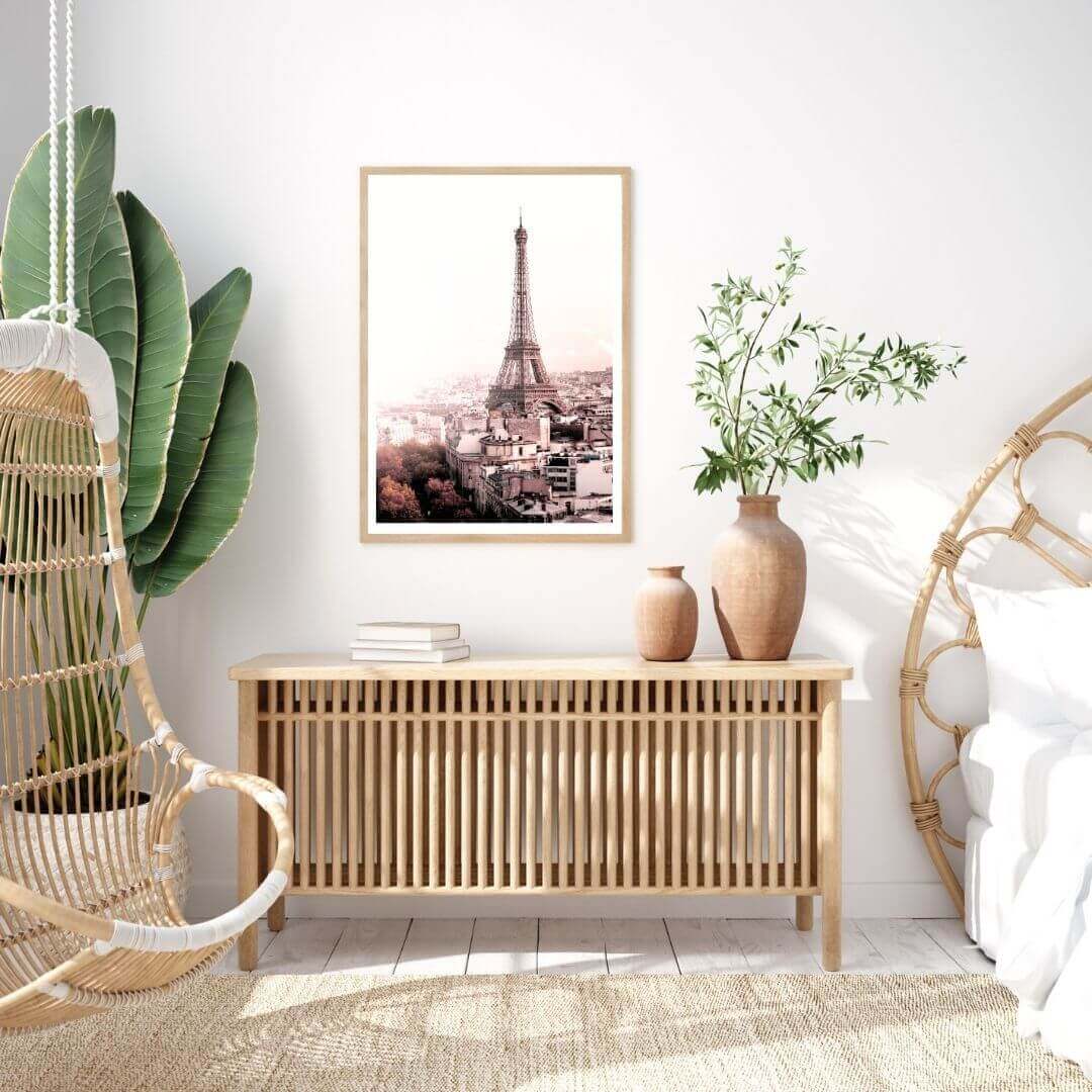 A wall art photo print of the Eiffel Tower in Paris with a timber frame to style your bedroom walls
