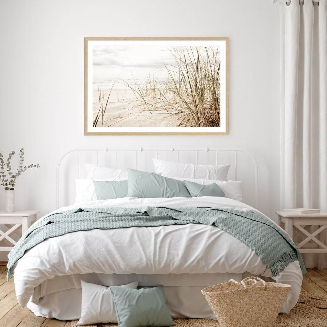 A wall art photo print of a grassy beach shore with a timber frame in bedroom shop online at Beautiful Home Decor with free shipping