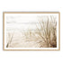 A wall art photo print of a grassy beach shore with a timber frame, white border by Beautiful Home Decor