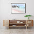 A wall art photo print of a pink beach in Greece with a black frame or unframed to decorate a wall above your console table