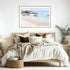 A wall art photo print of a pink beach in Greece with a timber frame or unframed for the wall above your bedroom bed