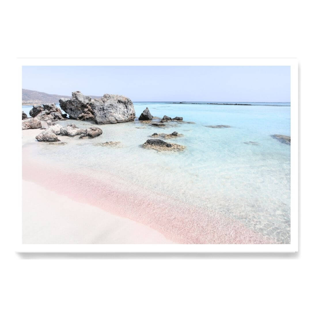 A wall art photo print of a pink beach in Greece unframed with a white border by Beautiful HomeDecor