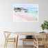A wall art photo print of a pink beach in Greece with a white frame or unframed to style your dining room