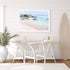 A wall art photo print of a pink beach in Greece with a white frame or unframed to decorate an empty wall