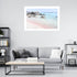 A wall art photo print of a pink beach in Greece with a white frame or unframed to decorate a wall in your office