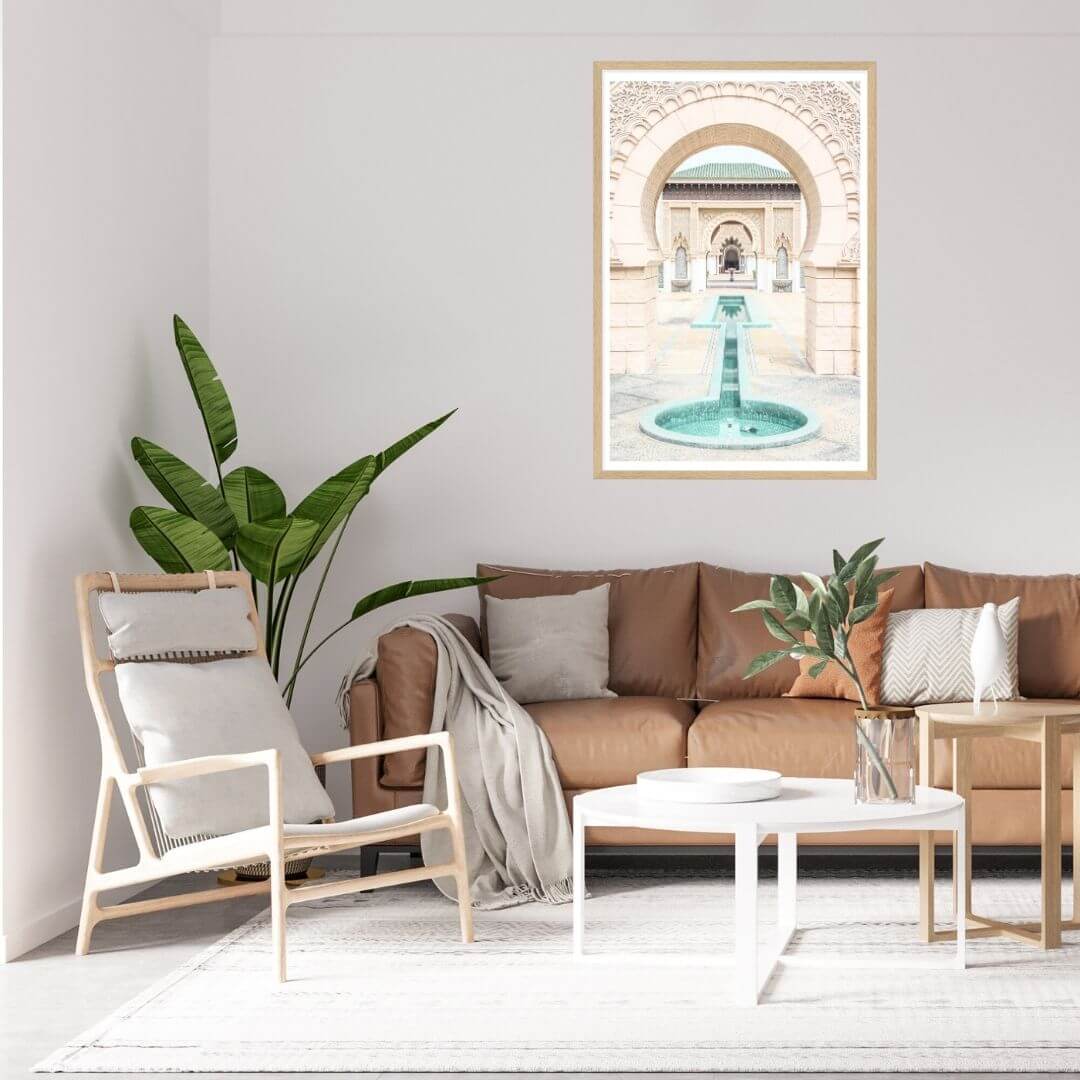 A wall art photo print of a Moroccan Temple water feature with a timber frame for the wall above sofa living room