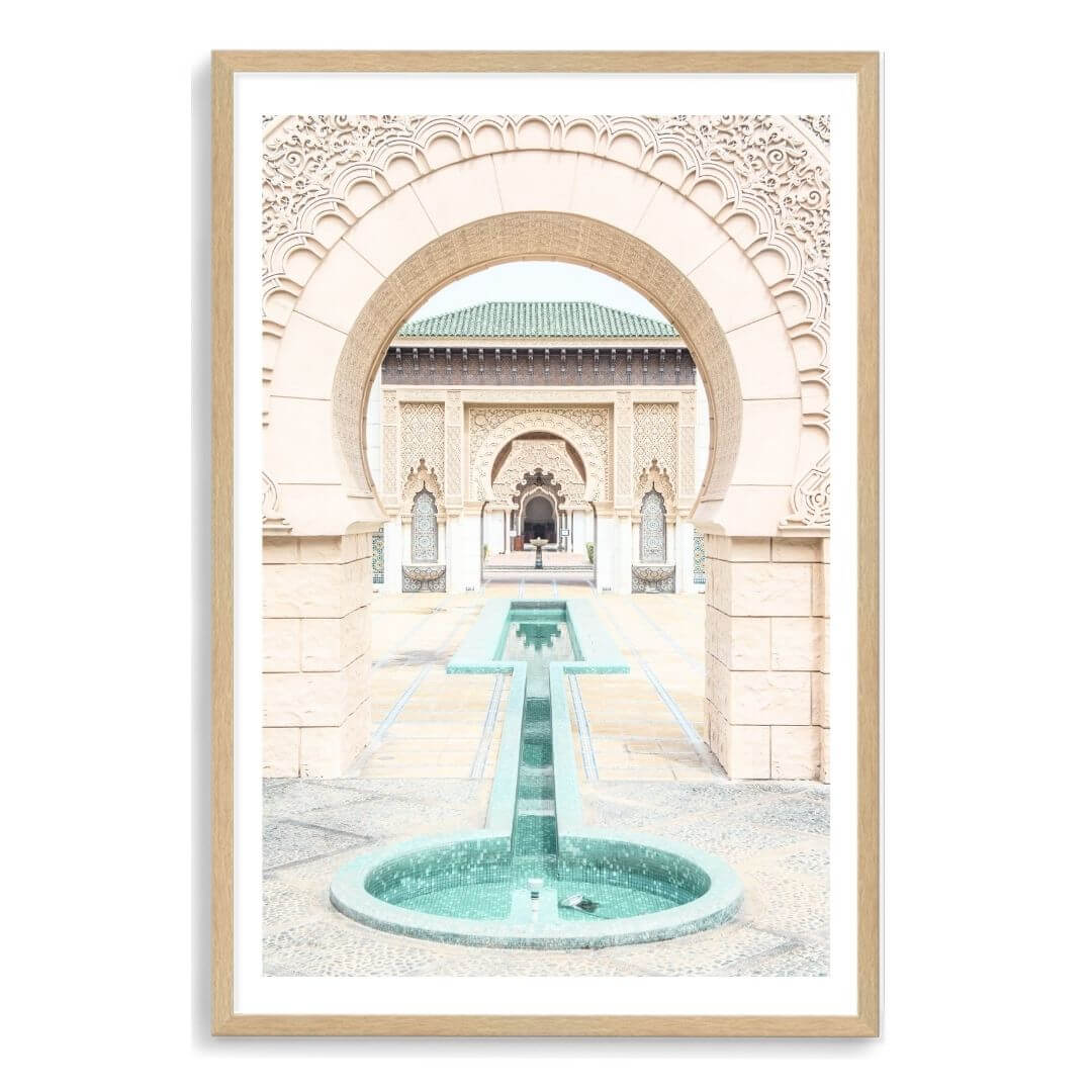 A wall art photo print of a Moroccan Temple water feature with a timber frame, white border by Beautiful Home Decor