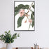 A wall art photo print of native gum eucalyptus flower a with a black frame, no border on office study room wall