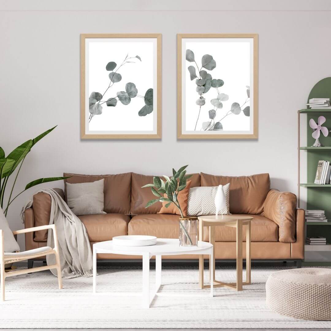 A set of 2 Australian Native Eucalyptus Leaves Wall Art Prints with a frame in timber for a living room wall