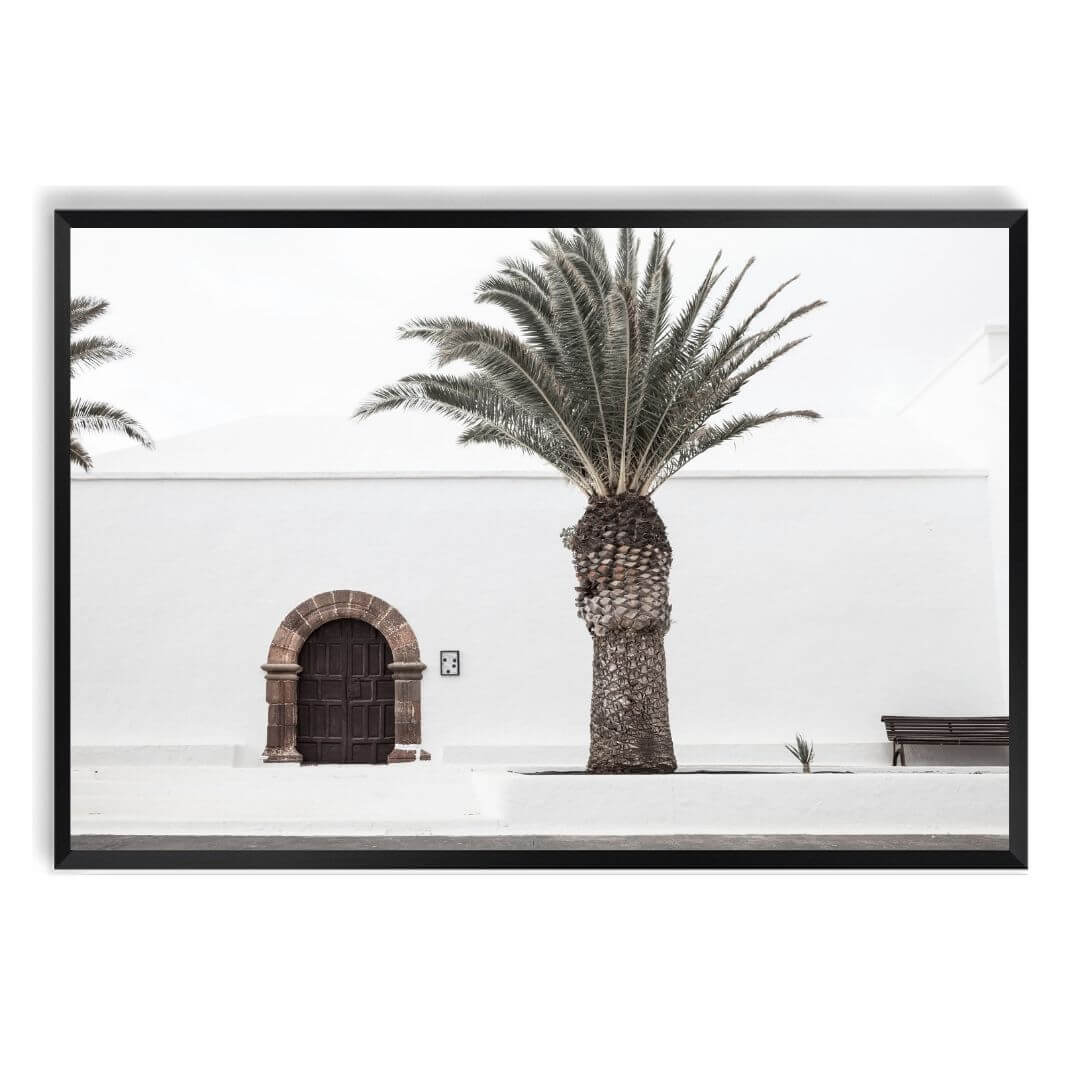 A wall art photo print of a white Spanish Church with a Palm Tree  with a black frame, no white border at Beautiful Home Decor