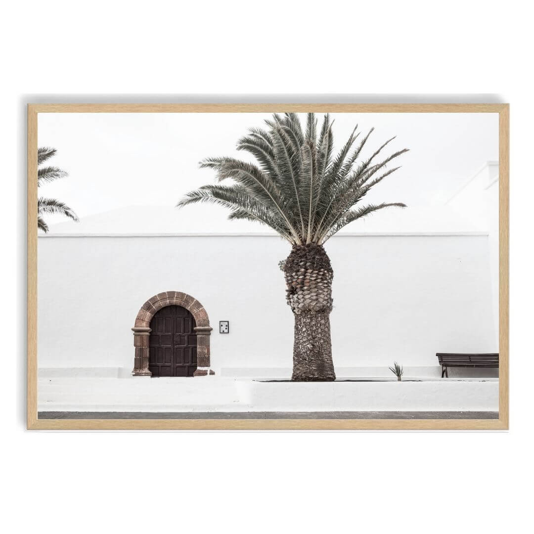 A wall art photo print of a white Spanish Church with a Palm Tree  with a timber frame, no white border at Beautiful Home Decor