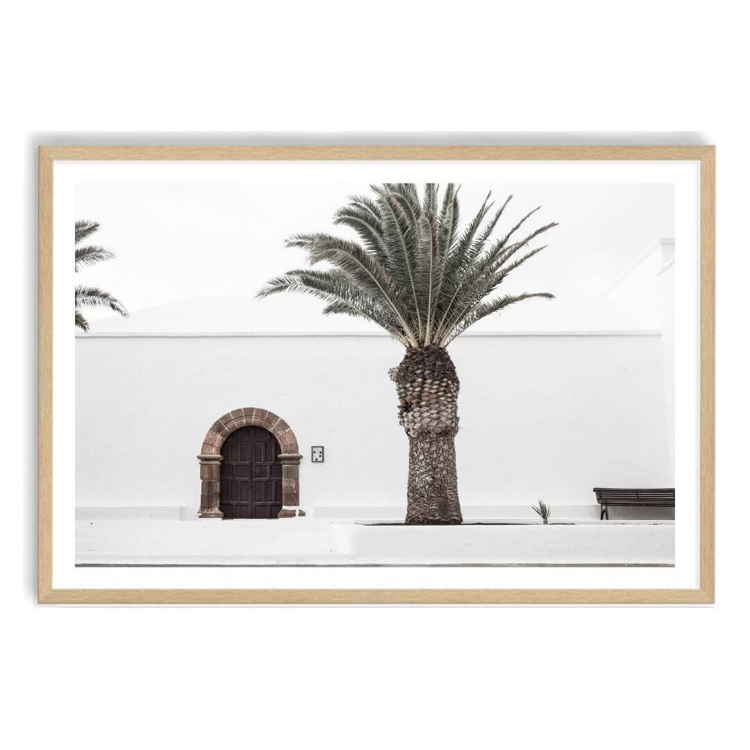 A White Spanish Church Wall Art Print with a Palm Tree  with a timber frame, white border by Beautiful Home Decor