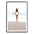 A wall art photo print of the girl with the surfboard with a black frame, white border by Beautiful Home Decor