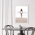 A wall art photo print of the girl with the surfboard with a timber frame or unframed for your dining room empty walls