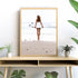 A wall art photo print of the girl with the surfboard with a timber frame or unframed to decorate your console table