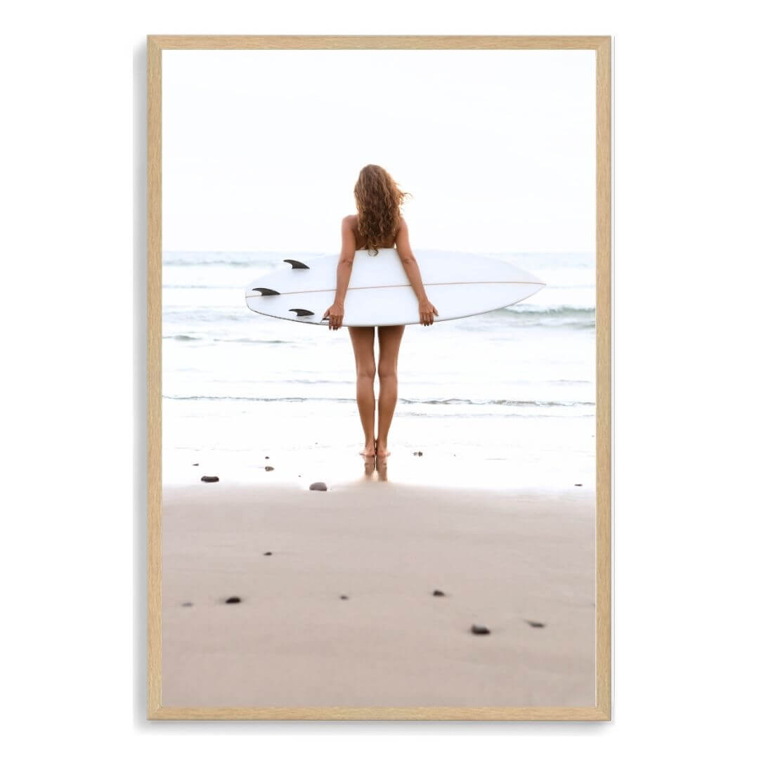 A wall art photo print of the girl with the surfboard with a timber frame, no white border at Beautiful HomeDecor