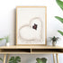 A wall art photo print of a turtle on the beach with a timber frame or unframed to decorate your console table
