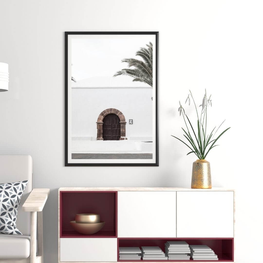 A white Spanish church and door Wall Art Print with a black frame or unframed for your office study wall