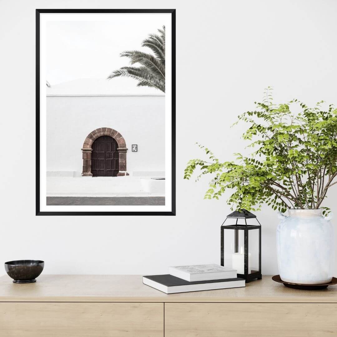 A white Spanish church and door Wall Art Print with a black frame or unframed to style shelves and empty walls