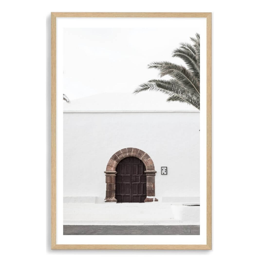 A white Spanish church and door Wall Art Photo Print with a timber frame, white border by Beautiful Home Decor