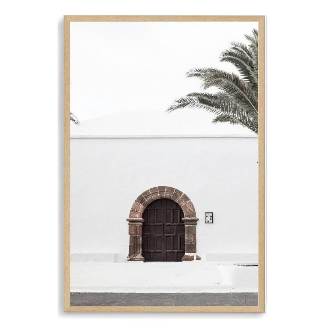 A white Spanish church and door Wall Art Print with a timber frame, no white border at Beautiful Home Decor