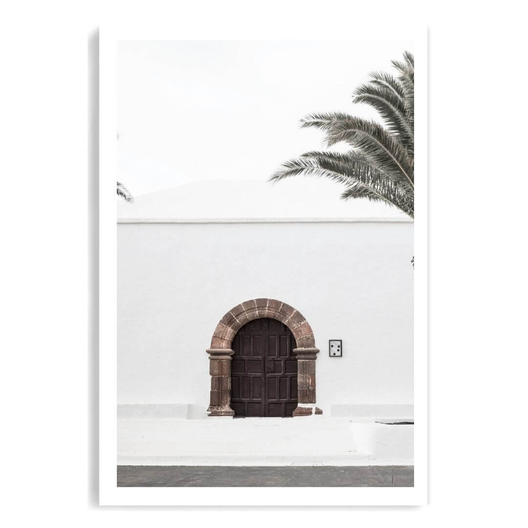 A white Spanish church and door Wall Art Print unframed with a white border by Beautiful Home Decor